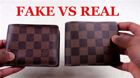 louis vuitton multiple wallet real vs fake|authentic used louis vuitton wallet.